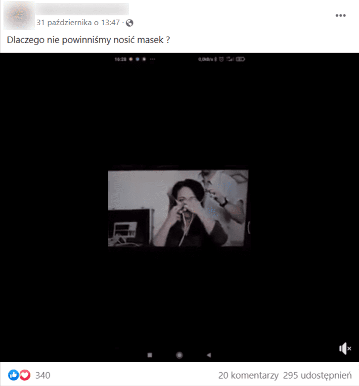 Zrzut ekranu popularnego wpisu na Facebooku, w którym dołączono film z udziałem eksperta. Na stopklatce nagrania znajduje się dziennikarka Ewa Drzyzga zakładająca specjalną maskę podłączoną do urządzenia, które sprawdza jakość oddechu. 