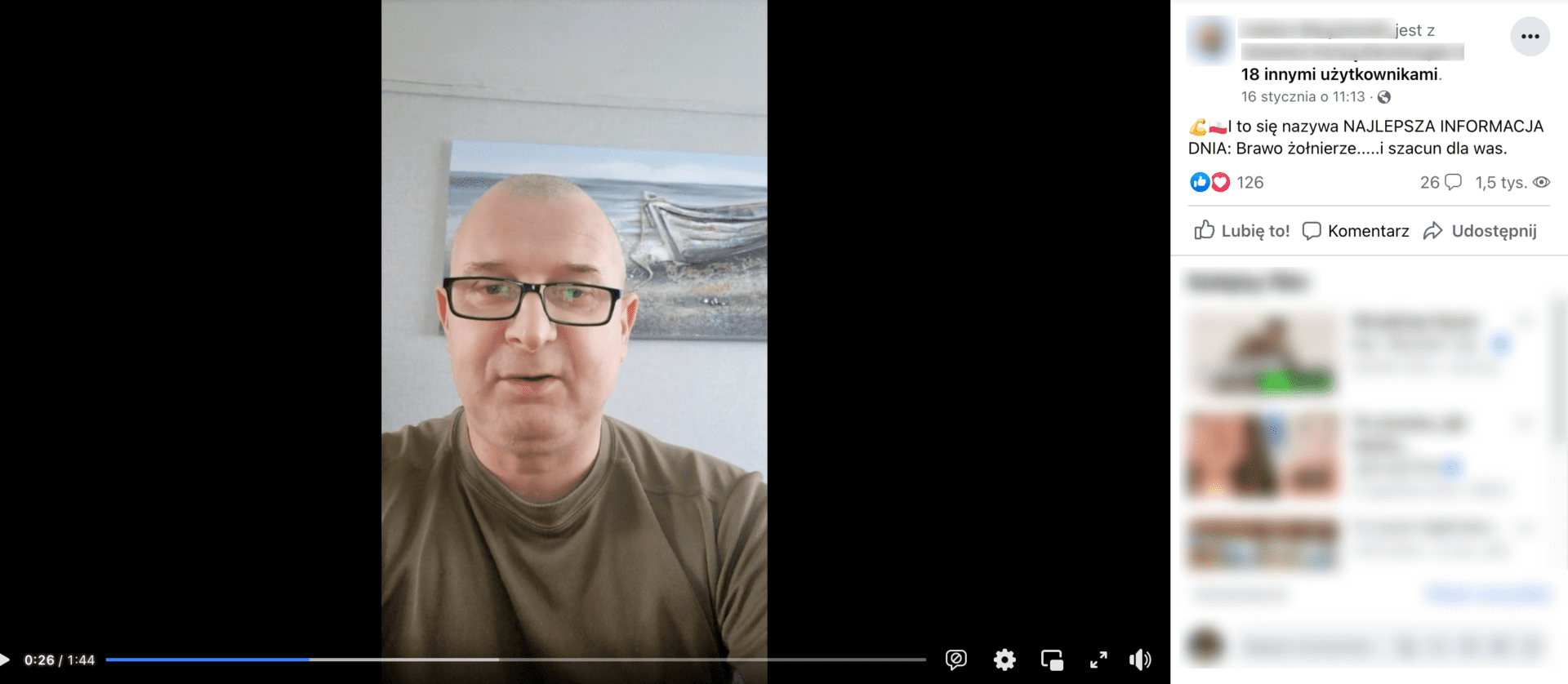 Zrzut ekranu posta na Facebooku, w których udostępniono omawiane nagranie. Widoczny jest łysy mężczyzna w okularach, w bluzce w kolorze khaki. Za nim na ścianie wisi obraz przedstawiający nadmorski krajobraz. Ten konkretny wpis zdobył ponad 120 reakcji, ponad 20 komentarzy i ponad 1,5 tys. udostępnień.