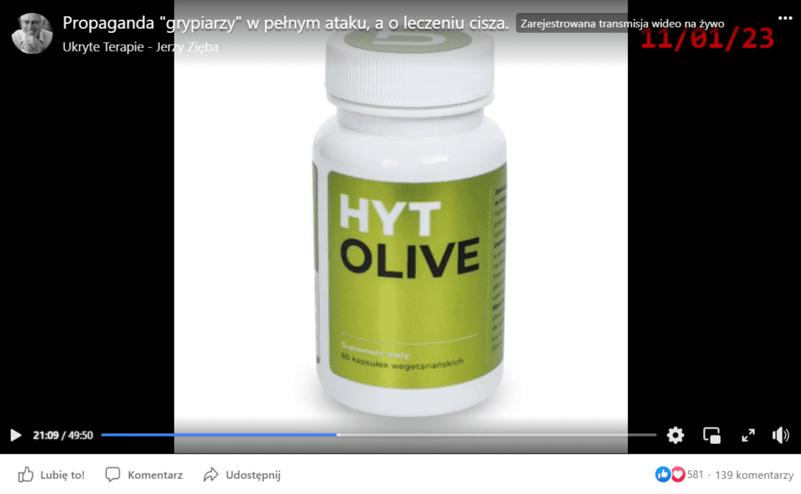 Zrzut ekranu z filmu opublikowanego przez Jerzego Zięby. Na zdjęciu widać butelkę z napisem "HYT OLIVE". 
