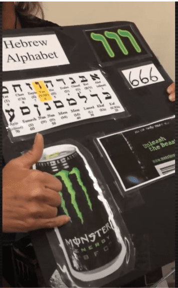 Kadr z nagrania, w którym kobieta przekonuje, że Monster energy tak naprawdę przesiąknięte jest znakami diabła. 