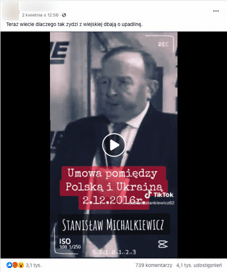 Zrzut ekranu posta na Facebooku, w którym zamieszczono omawiane nagranie z udziałem Michalkiewicza. Widoczny jest mężczyzna w białej koszuli, marynarce, pod krawatem.