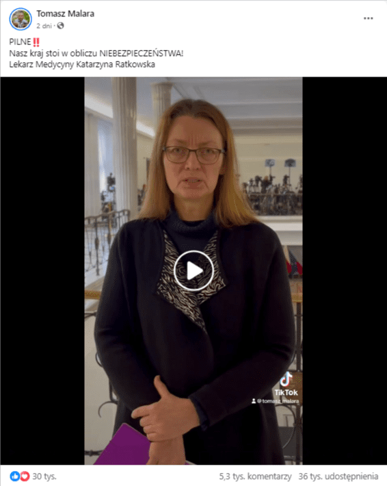 Nagranie na Facebooku, w kadrze widać Katarzynę Ratkowską stojącą na środku kadru, za nią jest wnętrze budynku sejmowego. Ubrana jest w ciemny płaszcz ze wzorzystą chusta. Na nosie ma okulary.