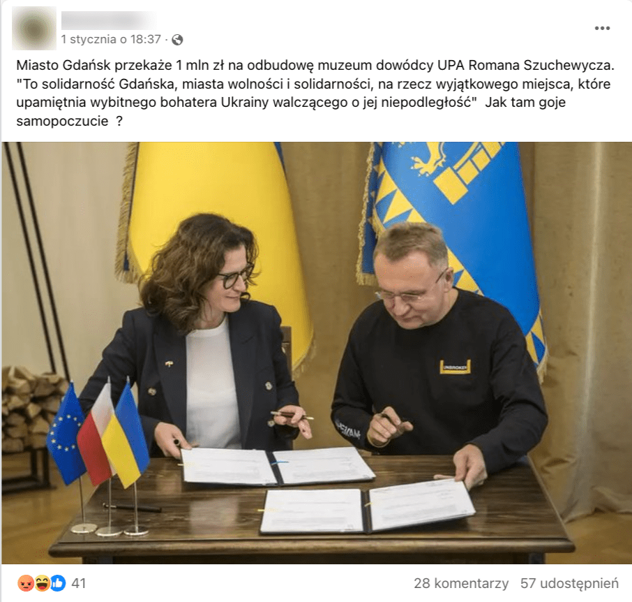 Zrzut ekranu z Facebooka. Do posta dołączono zdjęcie, na którym widać siedzących przy stole kobietę i mężczyznę, którzy wymieniają się dokumentami.