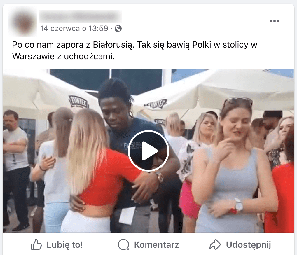 Zrzut ekranu omawianego posta na Facebooku. W kadrze filmu są tańczące pary. Na pierwszym planie czarnoskóry mężczyzna tańczący z białoskórą kobietą. 