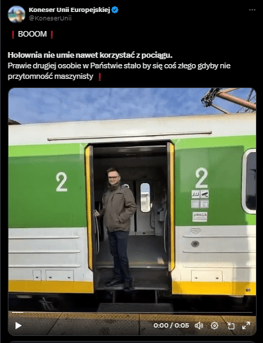 Zrzut ekranu z platformy X, na którym widnieje materiał wideo z Szymonem Hołownią, który rzekomo nie potrafi korzystać z pociągów. Film jest stworzony przez AI. 